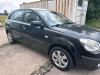 Gebraucht Kia Rio 96 PS (70 kW) 2009 Schwarz Limousine