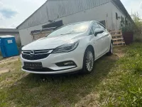 Używany Opel Astra Dynamic 125 KM (91 kW) 2016 Biały Sedan/Limuzyna