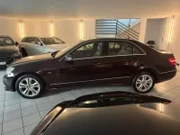 Używany Mercedes E250 204 KM (150 kW) 2009 Brązowy Sedan/Limuzyna
