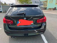 Second-hand BMW 320 Performance 190 CP (139 kW) 2018 Negru Break