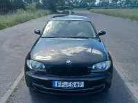 Gebraucht BMW 116 122 PS (89 kW) 2009 Schwarz Kleinwagen