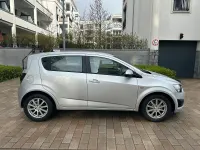 Gebraucht Chevrolet Aveo 101 PS (74 kW) 2012 Silber Limousine