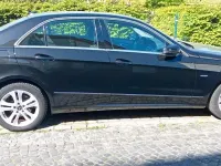 Second-hand Mercedes E200 184 CP (135 kW) 2009 Negru Berlinǎ