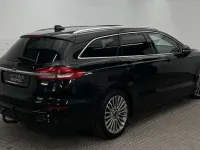 Gebraucht Ford Mondeo Titanium 300 PS (220 kW) 2022 Obsidianschwarz met (metallic) Kombi