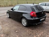 Gebraucht BMW 116 122 PS (89 kW) 2008 Schwarz Kleinwagen