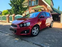 Gebraucht Chevrolet Aveo LT 101 PS (74 kW) 2011 Rot Limousine