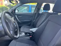 Second-hand BMW 116 122 CP (89 kW) 2008 Negru Hatchback