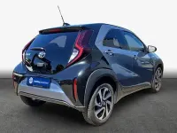 Gebraucht Toyota Aygo X Basis 72 PS (52 kW) 2025 Celestite grey metallic / night sky black SUV