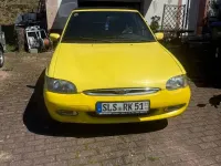 Gebraucht Ford Escort Cabriolet 90 PS (66 kW) 1996 Gelb Cabrio