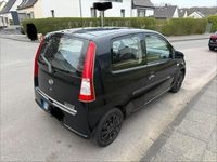 Gebraucht Daihatsu Cuore 58 PS (42 kW) 2006 Schwarz Kleinwagen