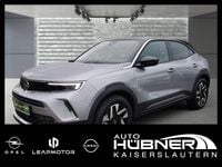 Gebraucht Opel Mokka-e Elegance 100 kW (136 PS) 2022 Kontrast grau/quarz silber SUV