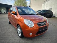 Second-hand Kia Picanto 65 CP (47 kW) 2009 Portocaliu Hatchback