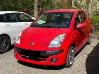 Gebraucht Nissan Pixo 68 PS (50 kW) 2009 Rot Kleinwagen