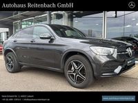 Gebraucht Mercedes GLC300e AMG 306 PS (225 kW) 2022 Lack graphitgrau Coupé