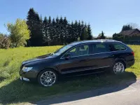 Używany Skoda Superb Elegance 170 KM (125 kW) 2012 Czarny Kombi