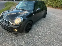 Gebraucht Mini Cooper 120 PS (88 kW) 2010 Schwarz Kleinwagen