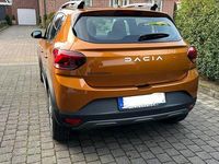 Gebraucht Dacia Sandero Expression 91 PS (66 kW) 2023 Orange Limousine