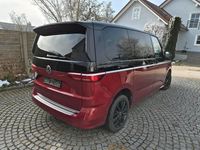 Gebraucht VW Multivan Style 150 PS (110 kW) 2023 Rot Van