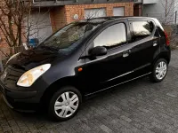 Gebraucht Nissan Pixo 68 PS (50 kW) 2010 Schwarz Kleinwagen