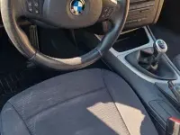Second-hand BMW 118 143 CP (105 kW) 2009 Negru Hatchback