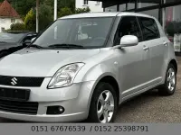 Używany Suzuki Swift Snow 92 KM (67 kW) 2006 Srebrny Hatchback