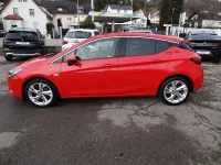 Używany Opel Astra Dynamic 150 KM (110 kW) 2016 Czerwony Sedan/Limuzyna