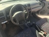 Second-hand Mazda 323 73 CP (53 kW) 1999 Argintiu Berlinǎ