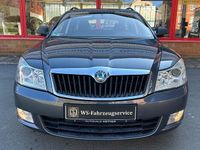 Używany Skoda Octavia 105 KM (77 kW) 2011 Szary Kombi
