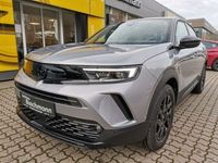 Gebraucht Opel Mokka 101 PS (74 kW) 2024 Kontrast grau metallic SUV