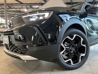 Gebraucht Opel Mokka-e Ultimate 100 kW (136 PS) 2023 Lackierung schwarz perla nera/typ aussenverkleidung metalliclackierung SUV
