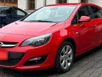 Używany Opel Astra 120 KM (88 kW) 2015 Czerwony Sedan/Limuzyna