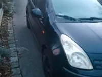 Gebraucht Nissan Pixo 68 PS (50 kW) 2010 Schwarz Kleinwagen