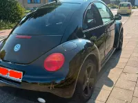 Gebraucht VW New Beetle 71 PS (52 kW) 2002 Schwarz Kleinwagen