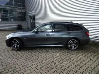 Gebraucht BMW 320e M Sport 204 PS (150 kW) 2022 Mineralgrau met. Kombi