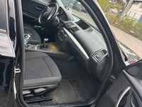 Second-hand BMW 320 143 CP (105 kW) 2010 Negru Hatchback