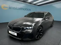 Gebraucht BMW 550 489 PS (359 kW) 2025 Grau Limousine