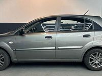 Gebraucht Kia Rio 75 PS (55 kW) 2010 Silber Limousine