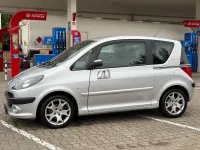 Gebraucht Peugeot 1007 108 PS (79 kW) 2008 Grau Van / Kleinbus