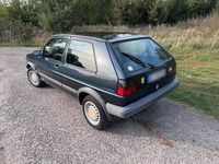 Second-hand VW Golf II 54 CP (39 kW) 1990 Albastru Hatchback