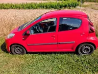 Gebraucht Peugeot 107 Active 65 PS (47 kW) 2012 Rot Kleinwagen