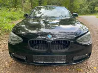 Używany BMW 118 143 KM (105 kW) 2014 Czarny Hatchback