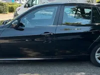 Gebraucht BMW 320 177 PS (130 kW) 2010 Schwarz Kombi
