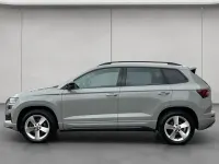 Gebraucht Skoda Karoq SportLine 190 PS (139 kW) 2023 Grau SUV