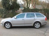 Second-hand Skoda Octavia Impuls Edition 105 CP (77 kW) 2010 Auriu Break