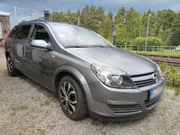 Używany Opel Astra 75 KM (55 kW) 2004 Purpurowy Kombi