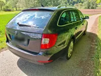 Używany Skoda Superb Elegance 170 KM (125 kW) 2012 Czarny Kombi