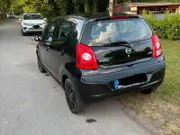 Gebraucht Nissan Pixo 63 PS (46 kW) 2011 Schwarz Kleinwagen