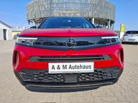 Gebraucht Opel Mokka 136 PS (100 kW) 2024 Lackierung rot rubi/typ aussen SUV