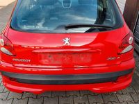 Gebraucht Peugeot 206+ 68 PS (50 kW) 2011 Rot Kleinwagen