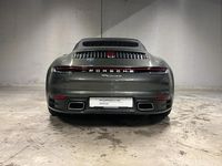 Gebraucht Porsche 911 Carrera 385 PS (283 kW) 2024 Aventuringrünmetallic Cabrio